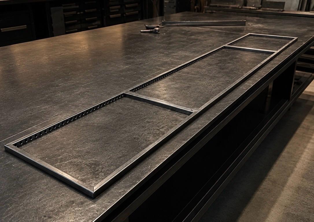 Top view of a handcrafted grill grate showing geometry and finish